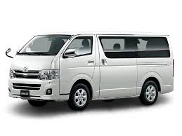 A white van positioned against a plain white background, emphasizing its color and simplicity.