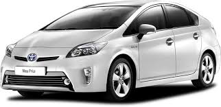 A Toyota Prius hybrid car parked, showcasing its sleek design and eco-friendly features in a modern urban setting.